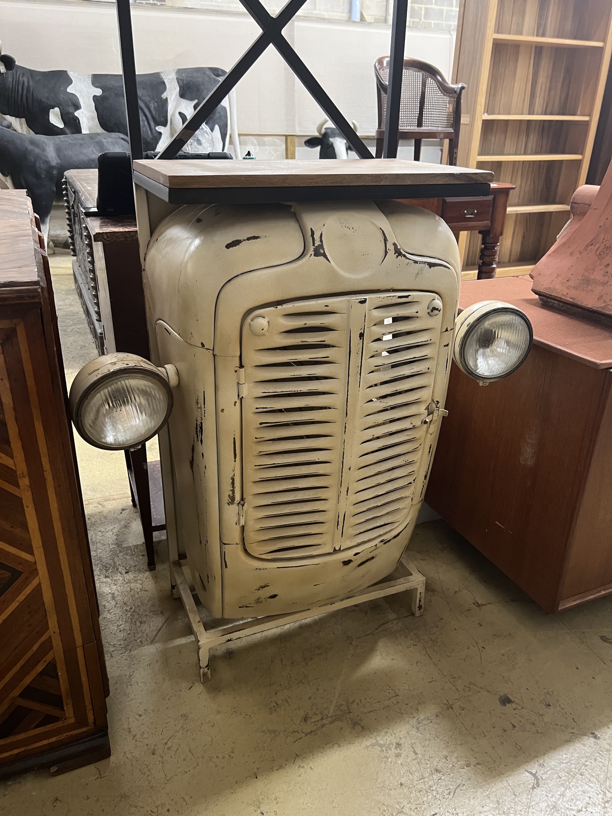A vintage 'tractor' front bar, length 81cm, depth 34cm, height 182cm